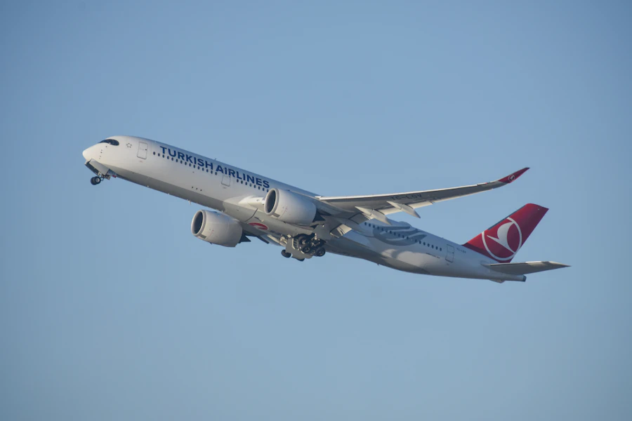 Plane taking off into clear sky