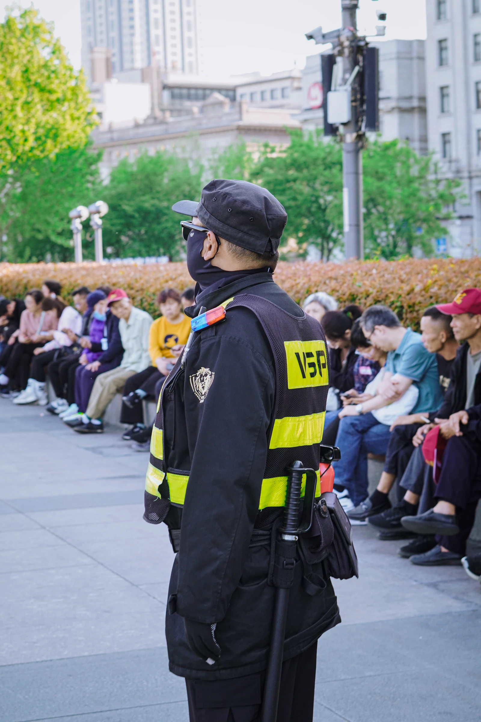 Hi-vis officer observing a public concourse