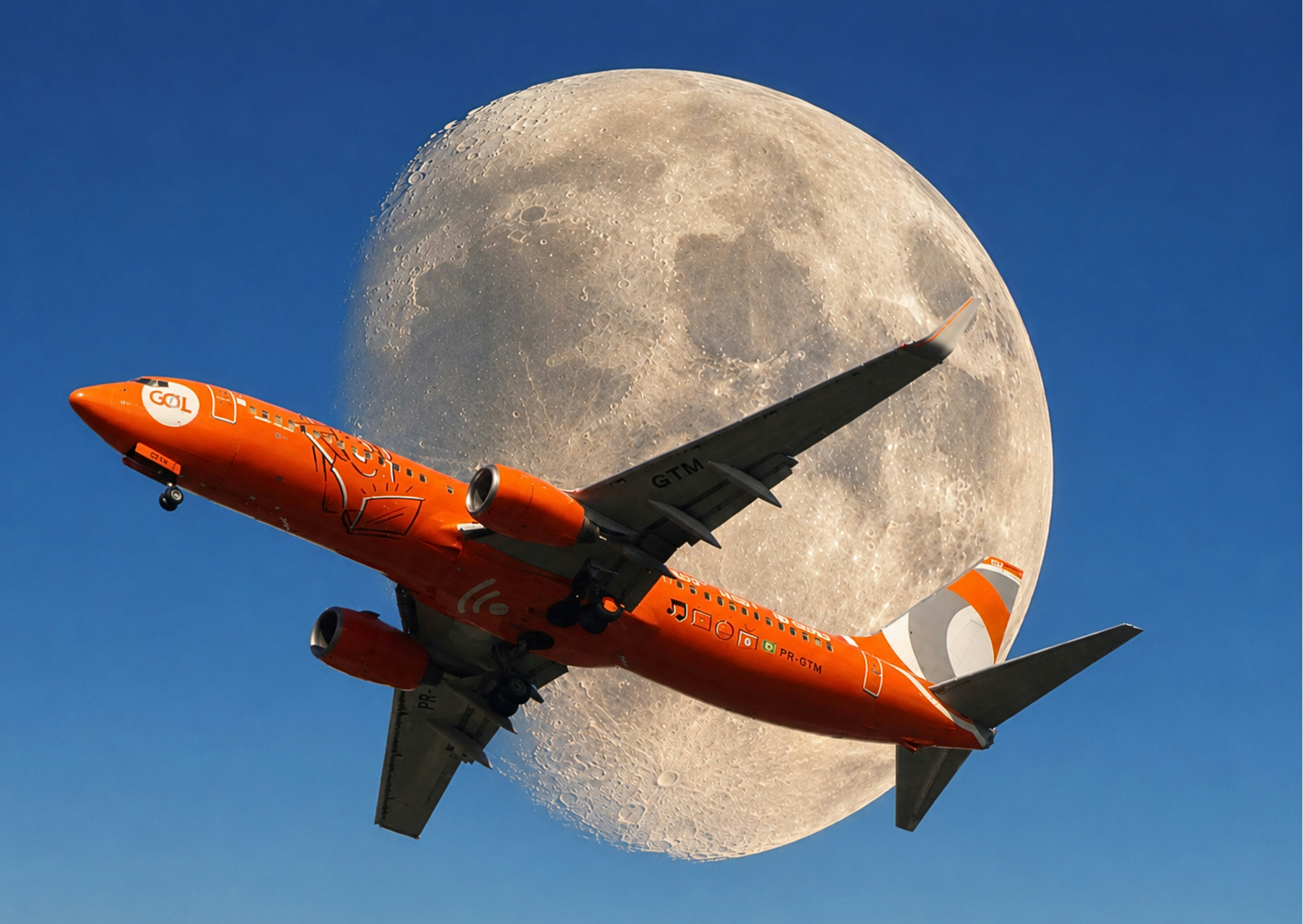 An orange airplane flying past a large full moon.