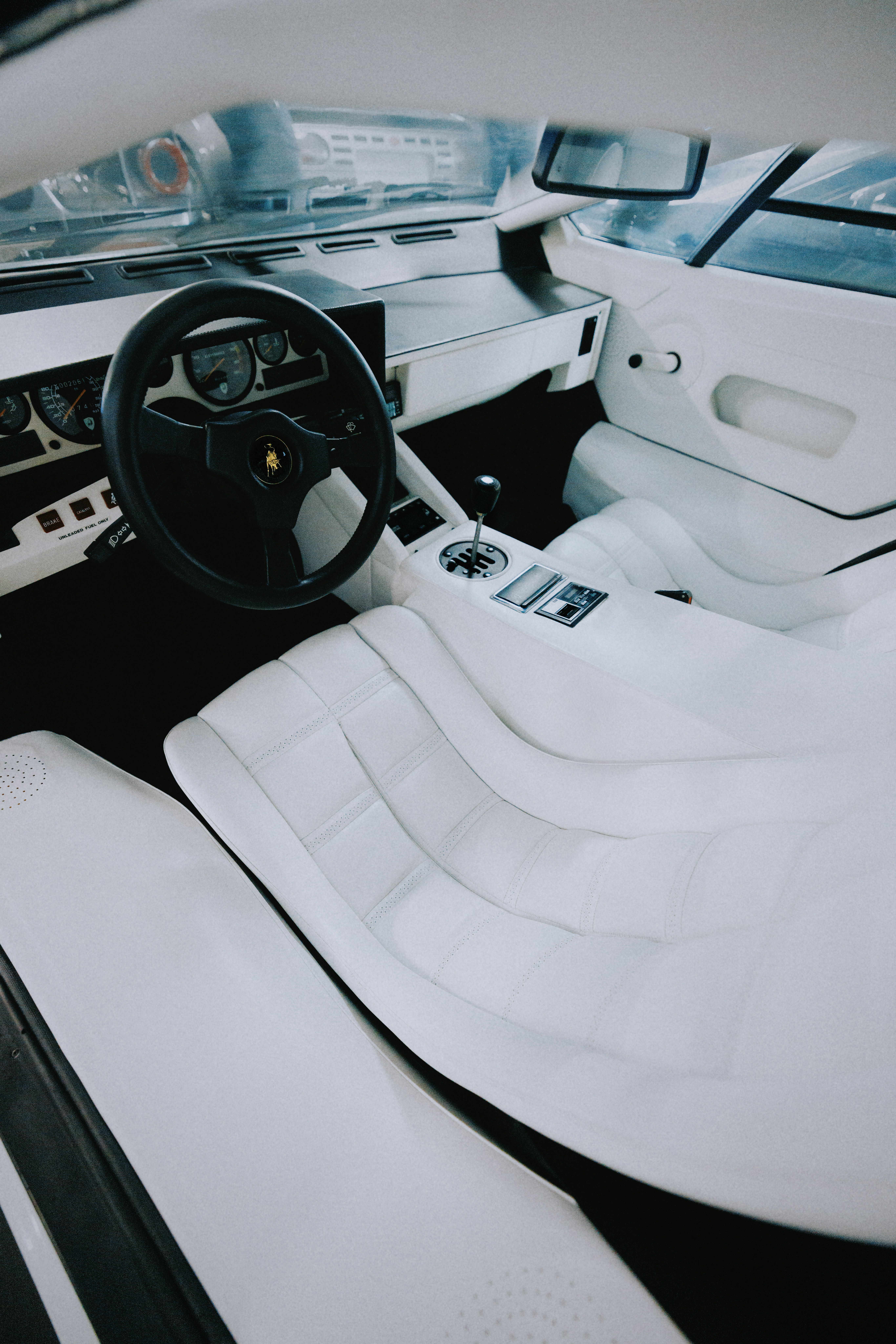 White interior of a classic sports car.