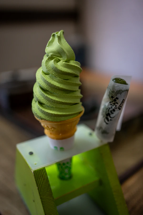 Matcha soft serve in a waffle cone