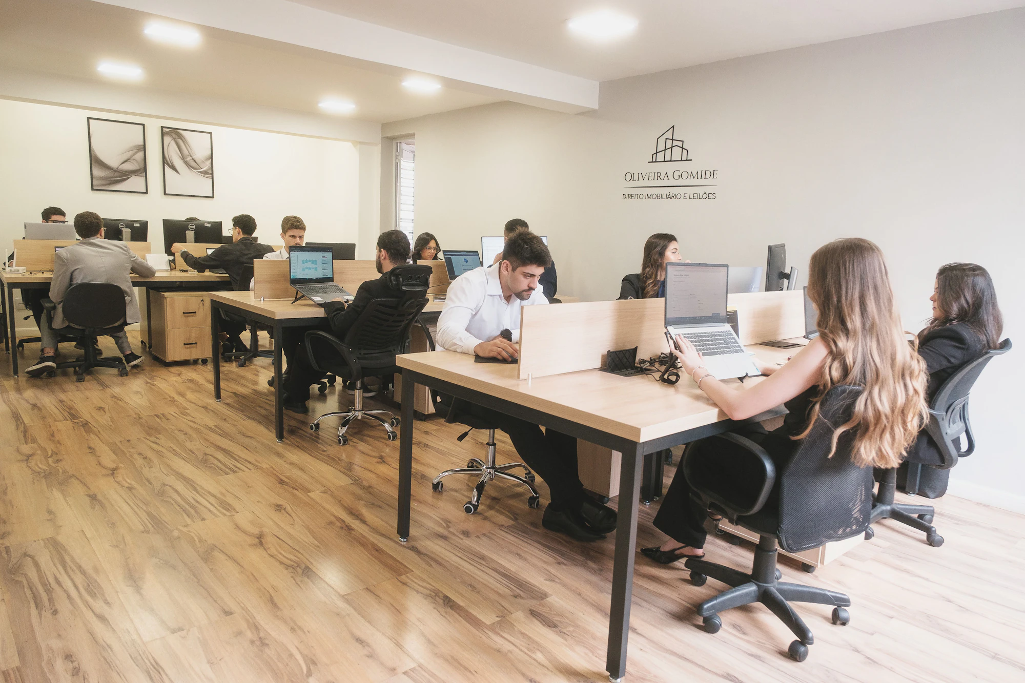 A friendly support team working in a bright, modern office