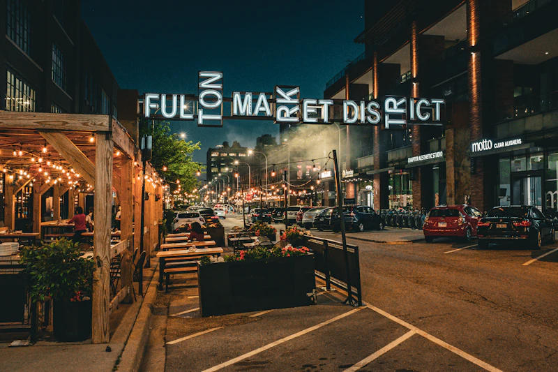 Fulton Market district street scene with outdoor dining at night