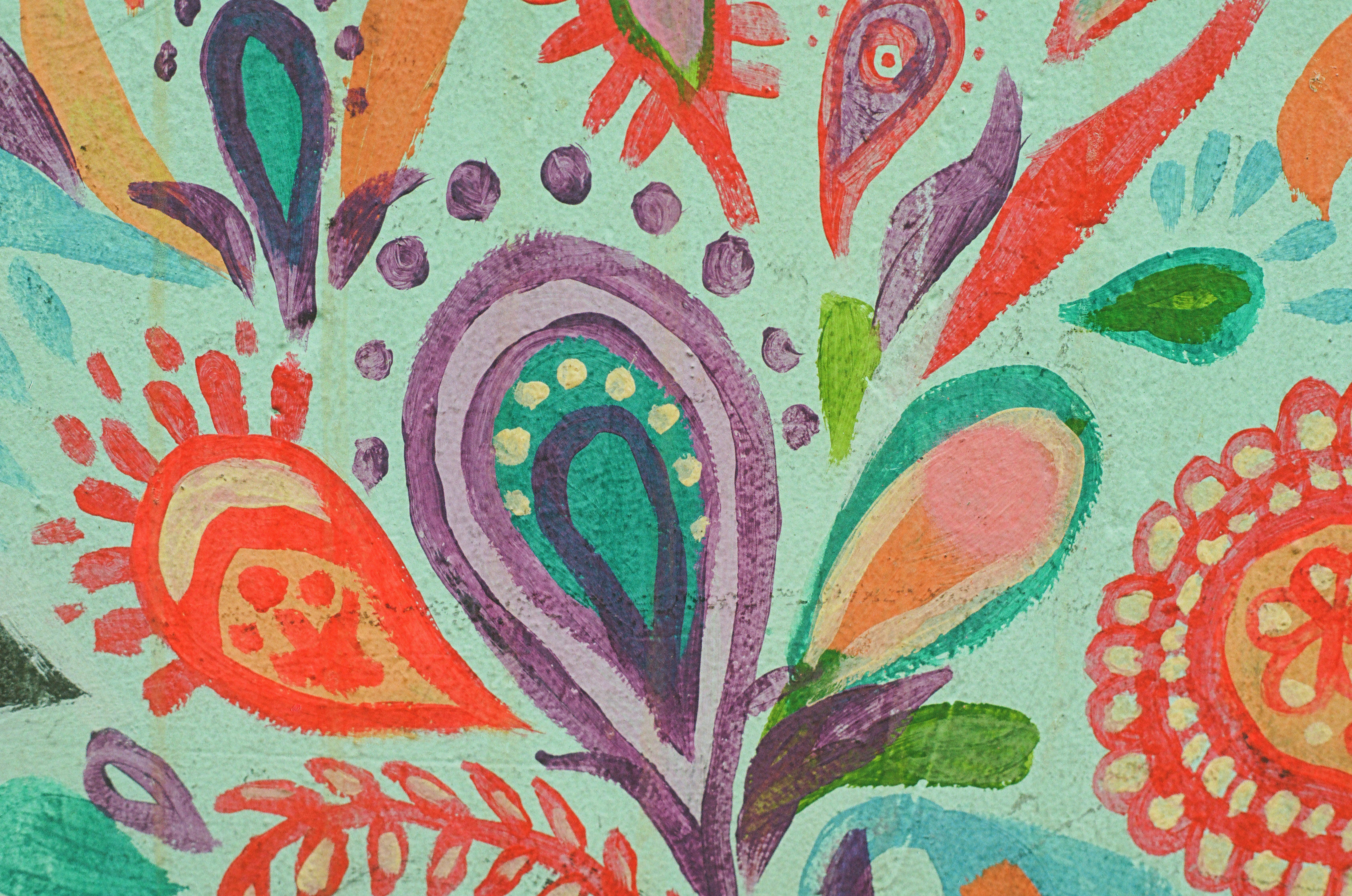 Seni abstrak yang semarak dan dilukis dengan tangan dengan elemen paisley berwarna-warni.