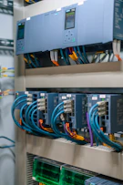 Industrial control panel with electronic modules and colorful wiring