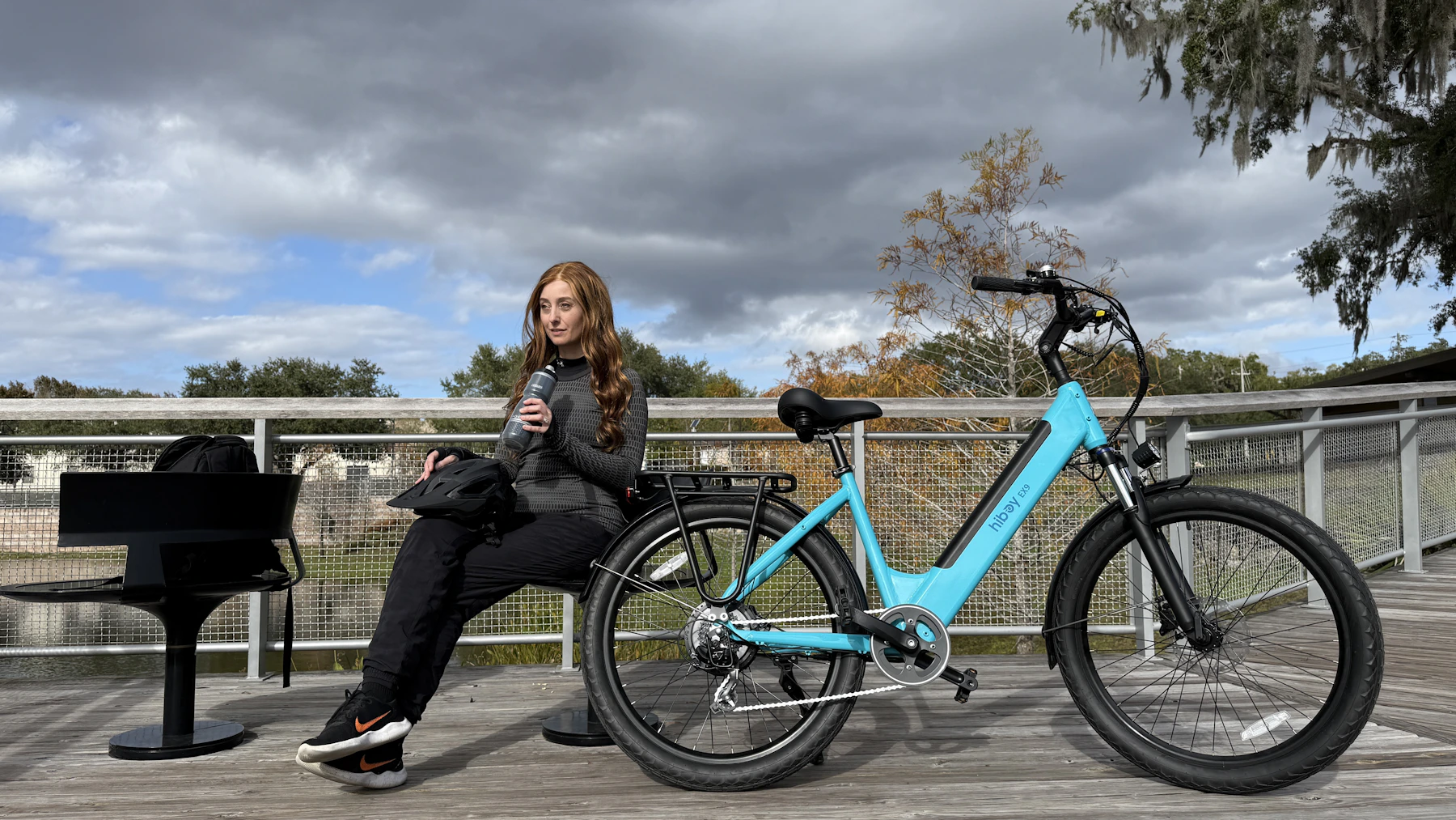 Cyclist with a commuter bicycle in an everyday outdoor setting