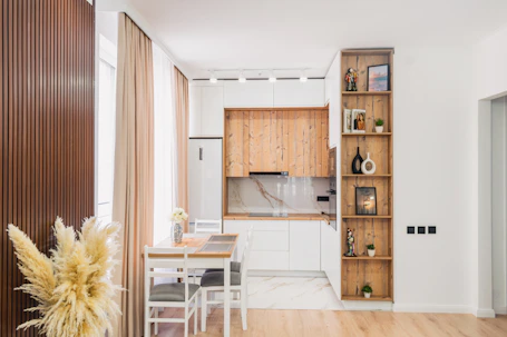 A modern kitchen and dining area with wooden accents.