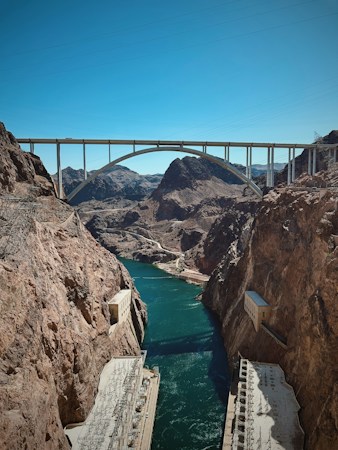 Hoover Dam and the arch bridge spanning Black Canyon on the Colorado River, the system that holds back Lake Mead east of Las Vegas