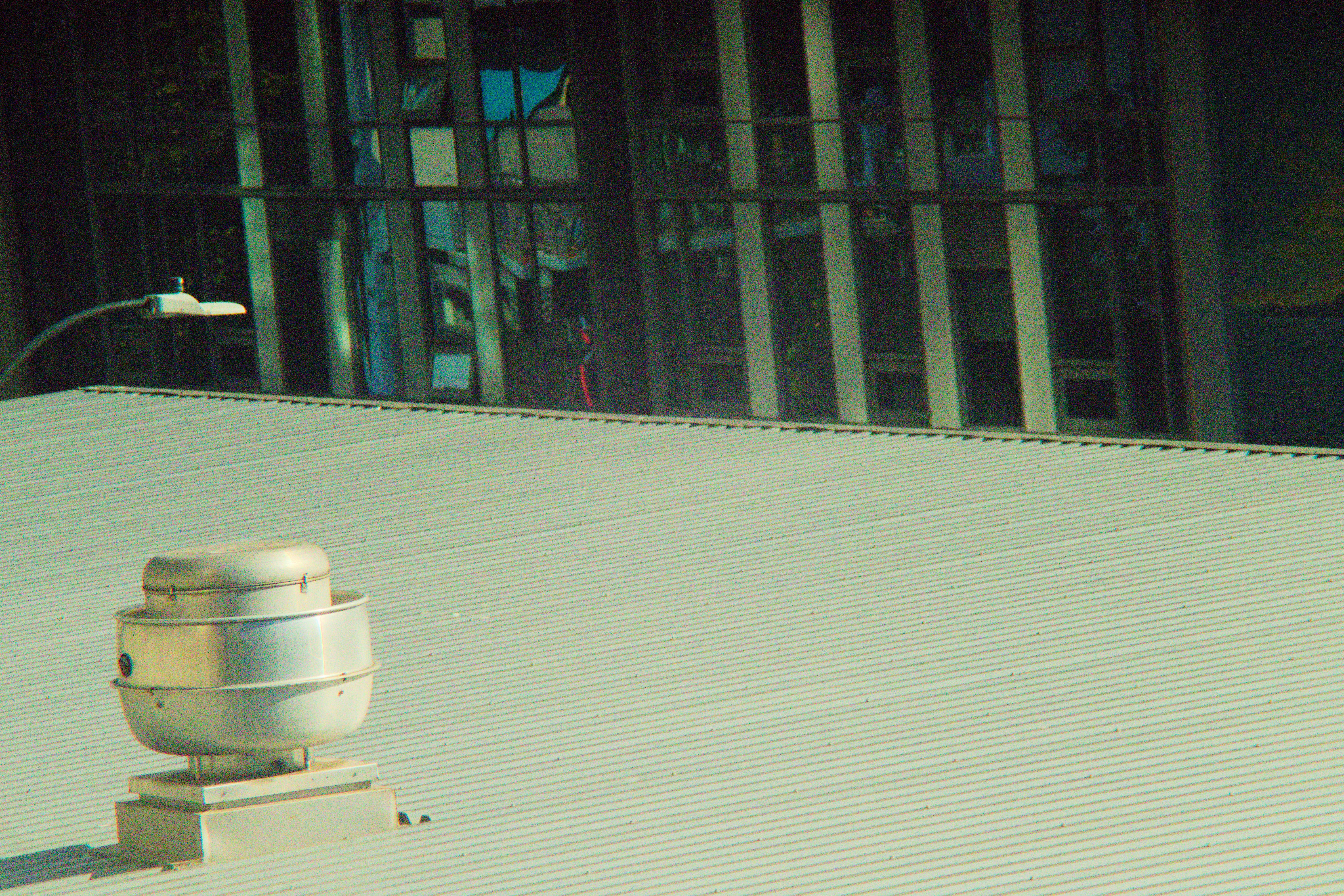 HVAC technician on rooftop
