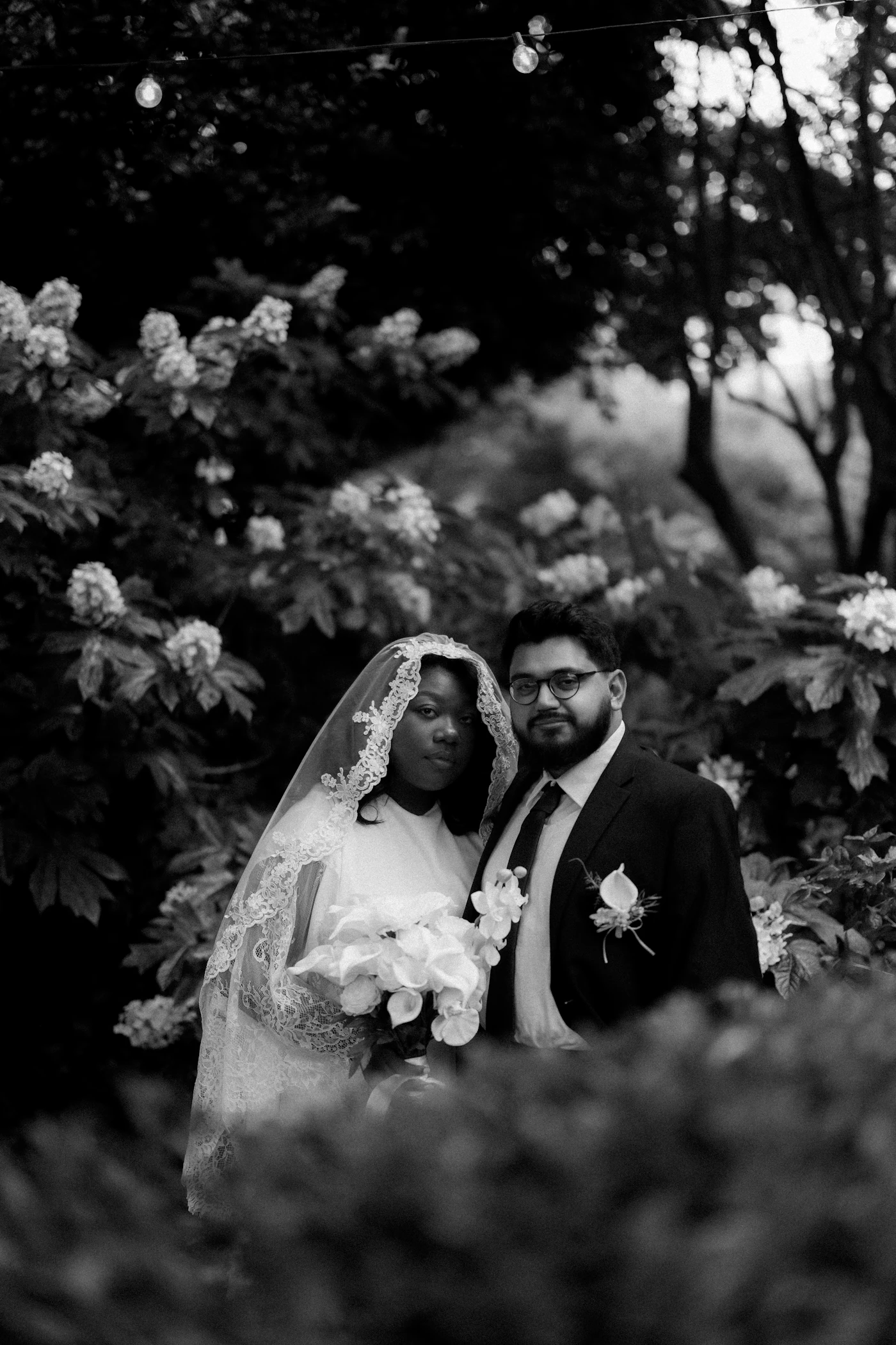 Sustainable wedding dress designers in California — A bride wearing an organic cotton gown in a California garden setting.