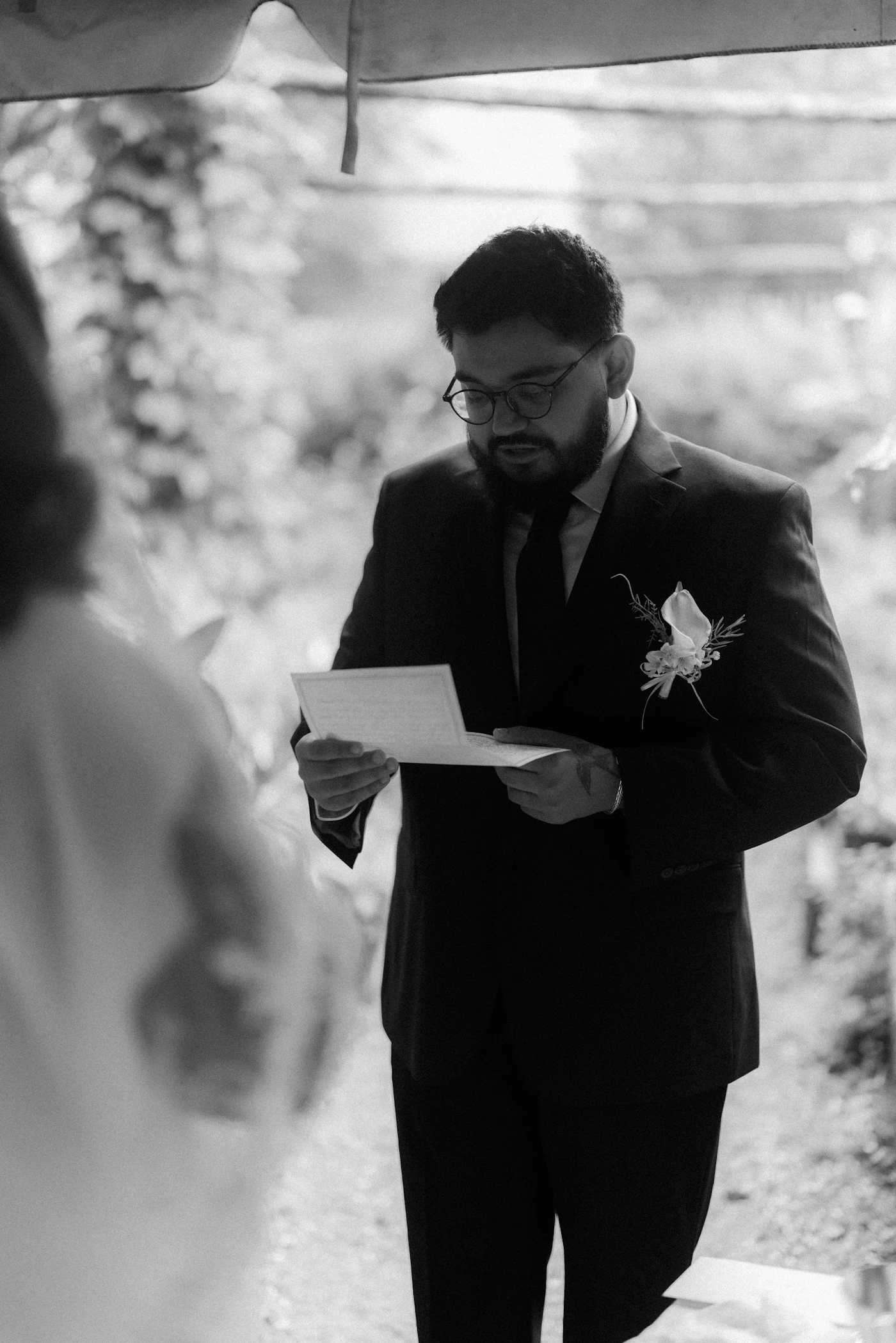 Secular readings for modern wedding ceremonies — A guest reads a secular passage during a modern wedding ceremony.