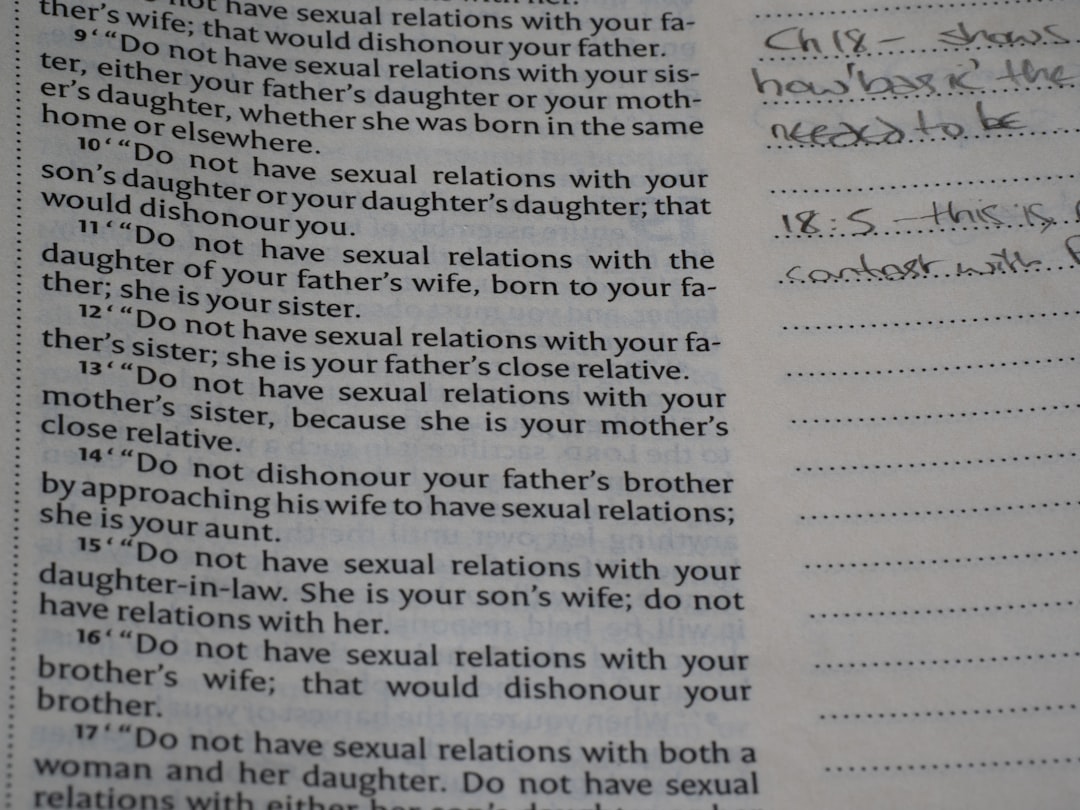 Book page displaying text about relationships and handwritten notes.