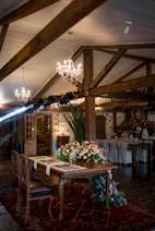 Elegant dining room with floral decorations and chandeliers