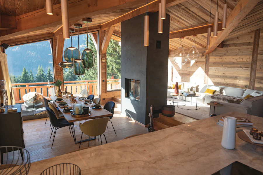 The Lake Suite — wooden interior with dining and living areas