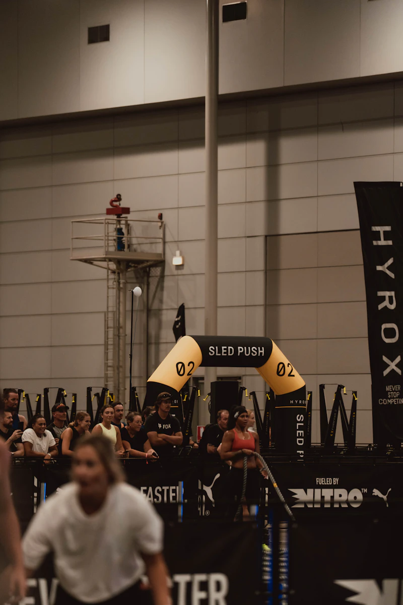 A sled push station at a fitness competition