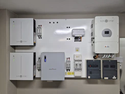 Wall-mounted solar power and energy storage system.
