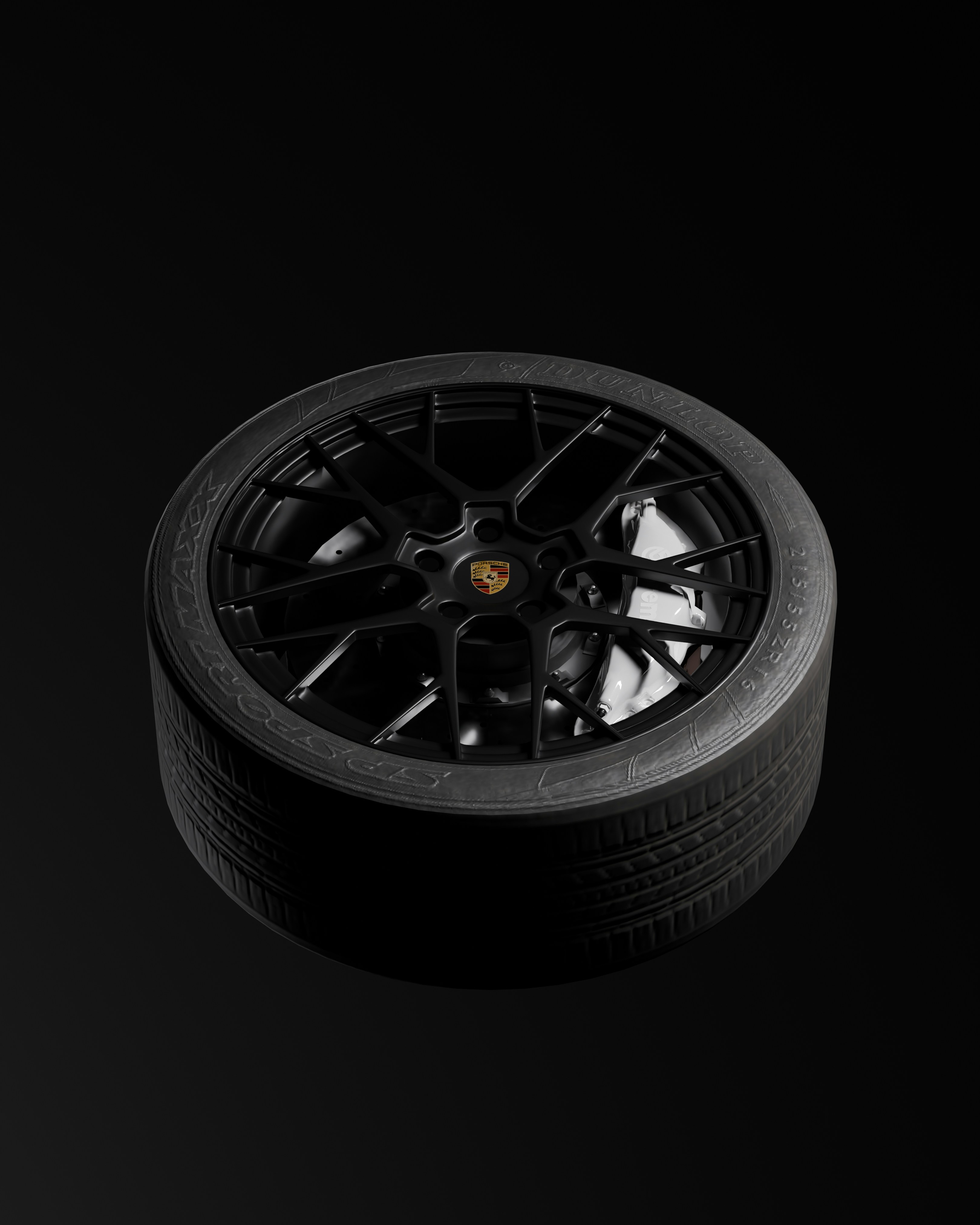 Ein schwarzes Autorad mit einem Porsche-Logo.