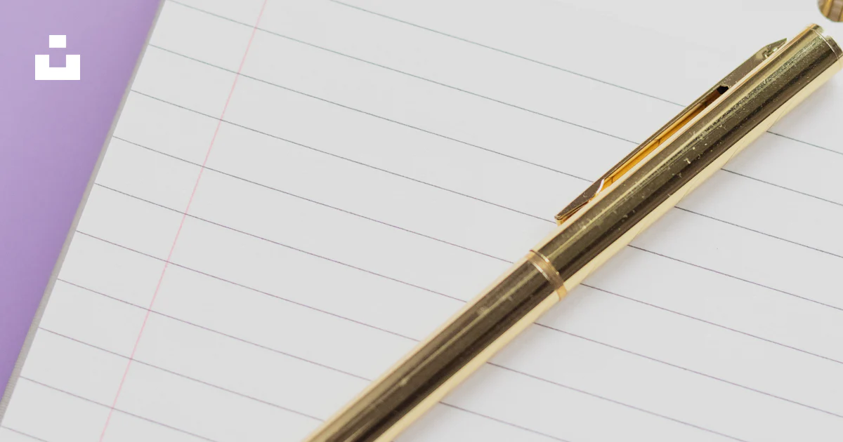 Backgrond Notebook Golden pen rests on a lined spiral notebook - Free Photo on Unsplash