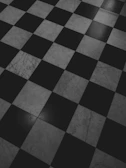 A classic black and white checkered floor pattern.