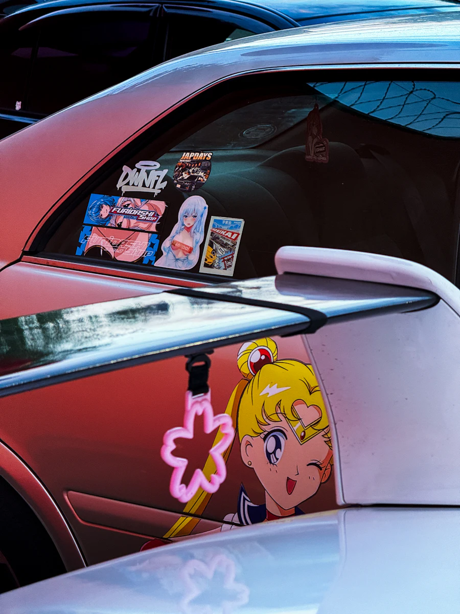 A car with a logo decal applied to its side.