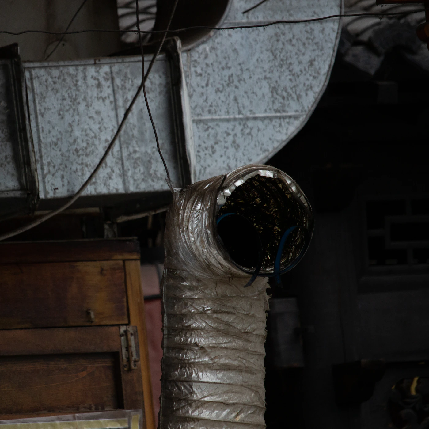 Flex duct beside galvanized sheet-metal ductwork