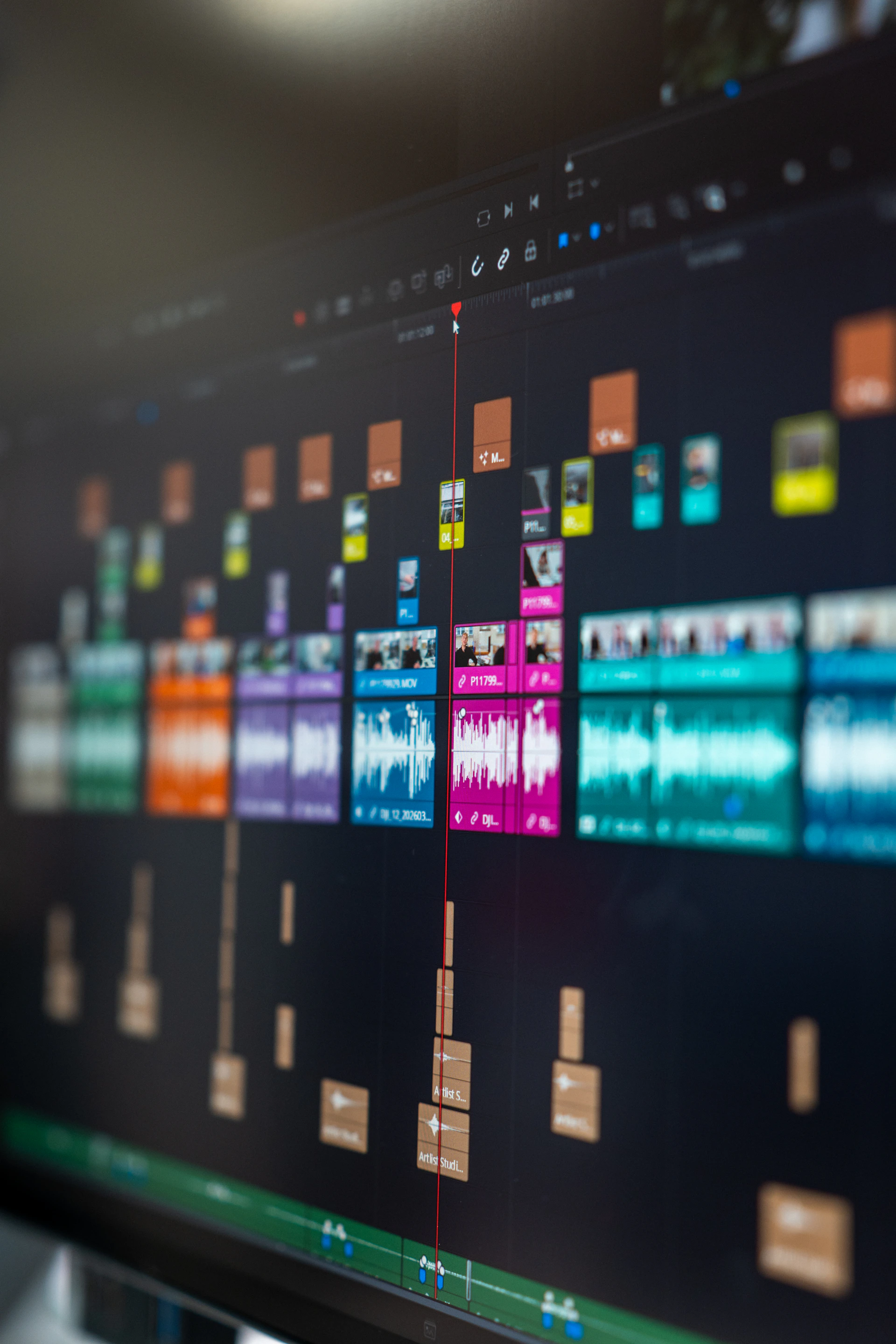 Video editing software interface with a timeline and media clips