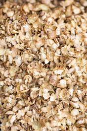 A large pile of dried, light brown hops.