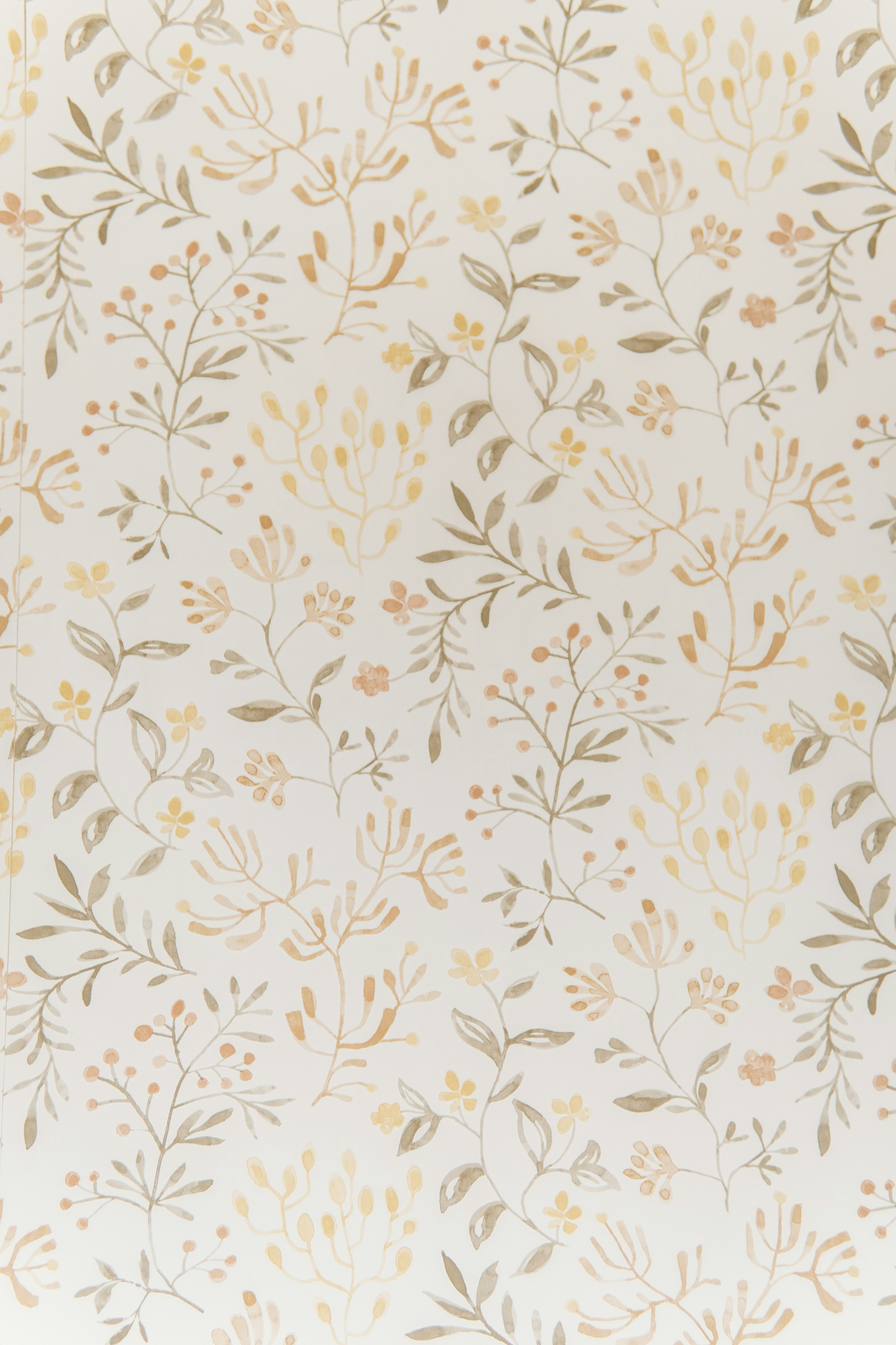 A subtle floral and botanical pattern on a light background.