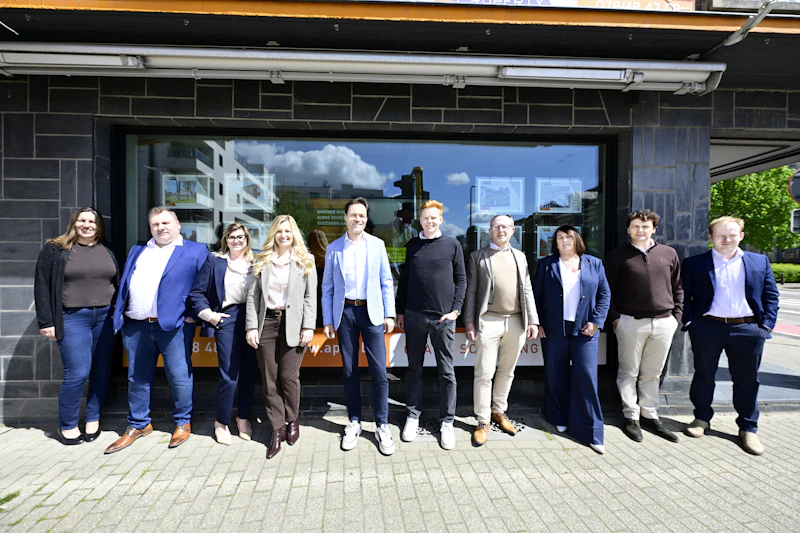 Property management professionals outside an office building