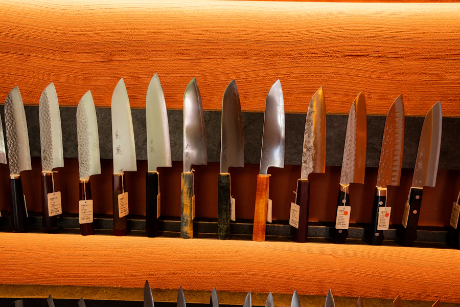 Kitchen knives laid out on a wooden board