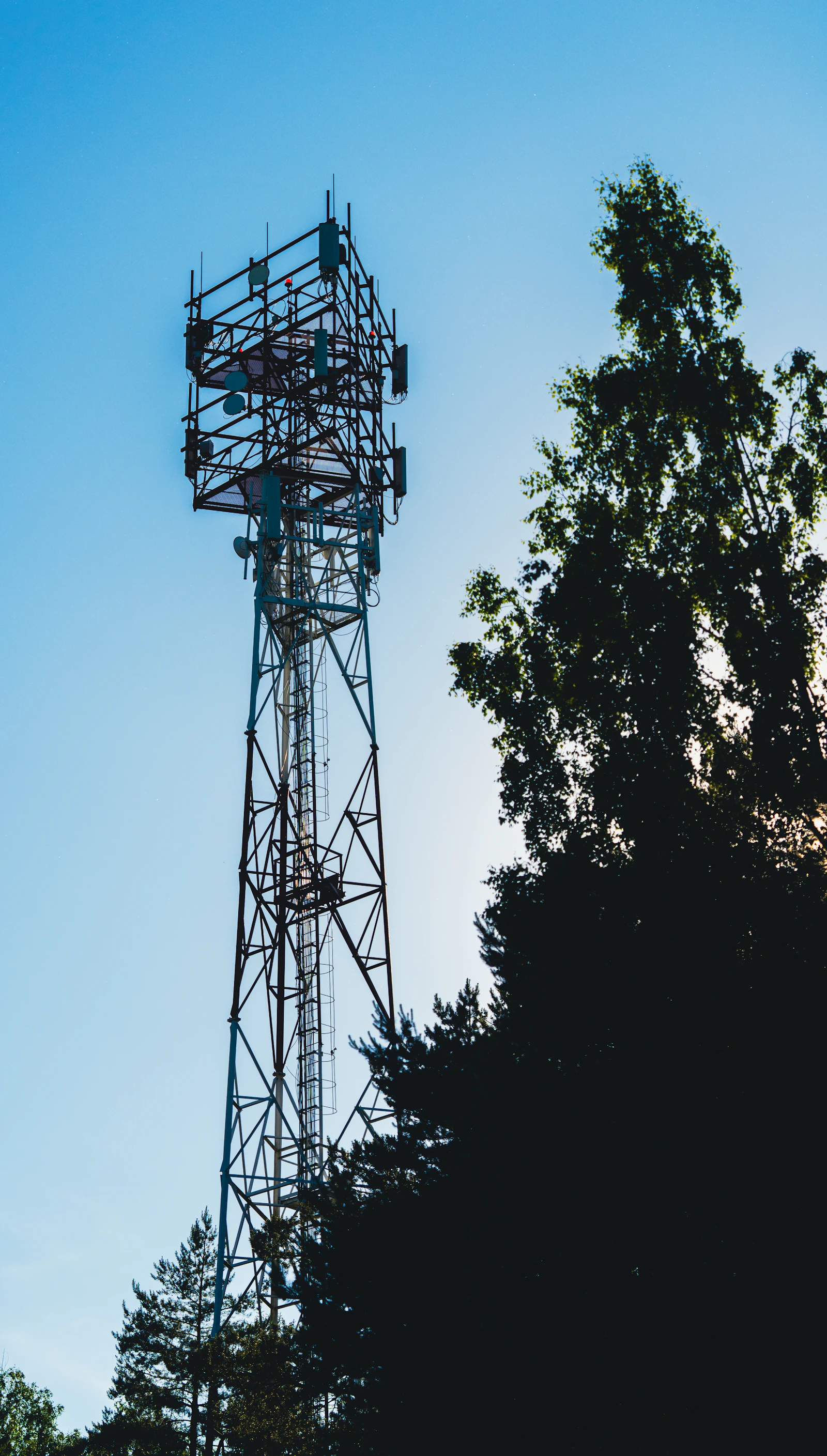 Communications tower against a blue sky