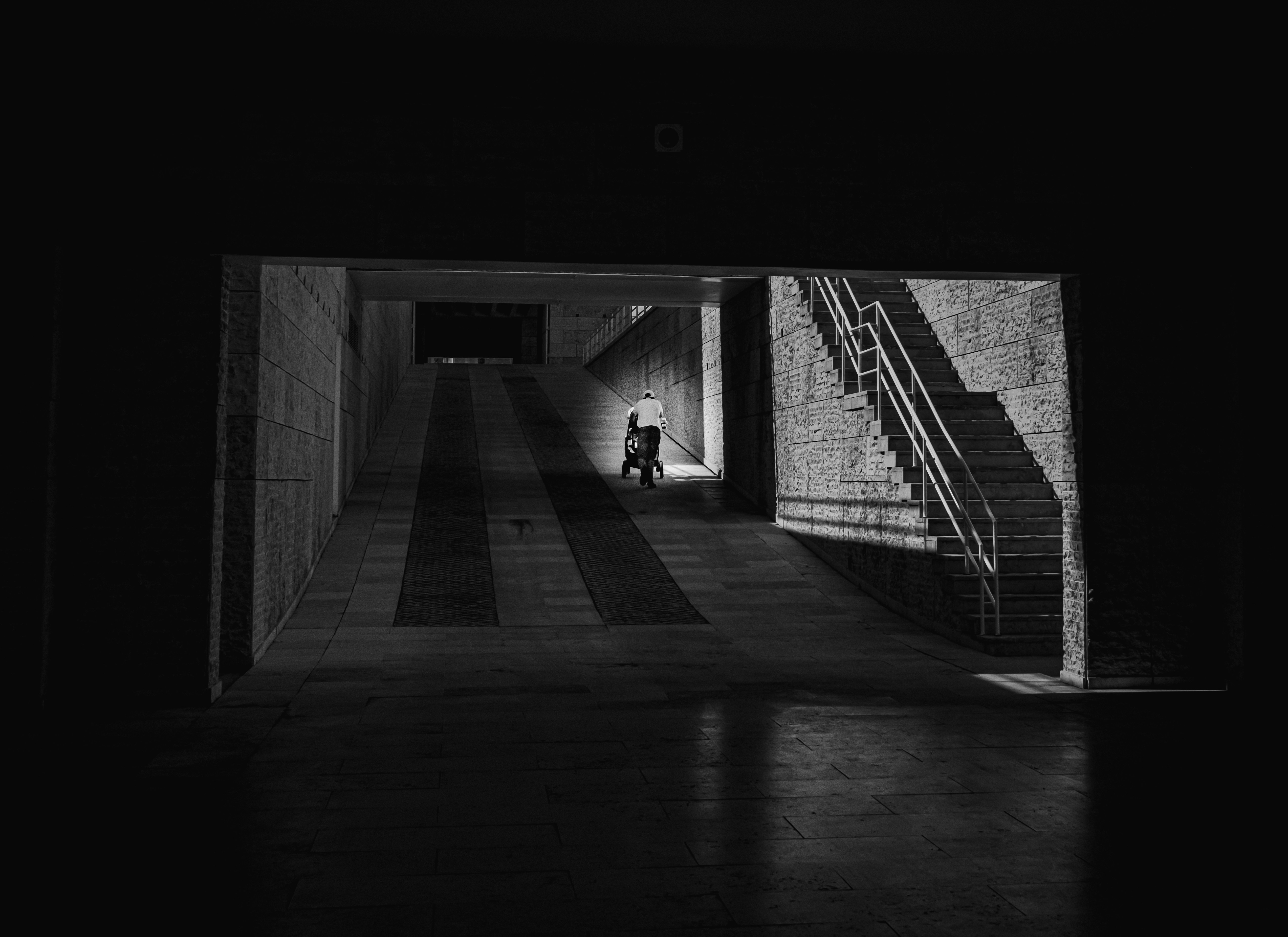 passerby blurred by motion