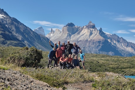Torres del Paine - A trekking group posed with the towers behind them