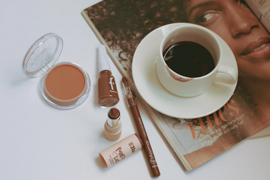 Flat lay of coffee and various brown-toned makeup products.