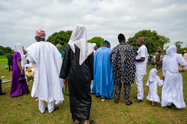 Community gathering in traditional attire, West Africa