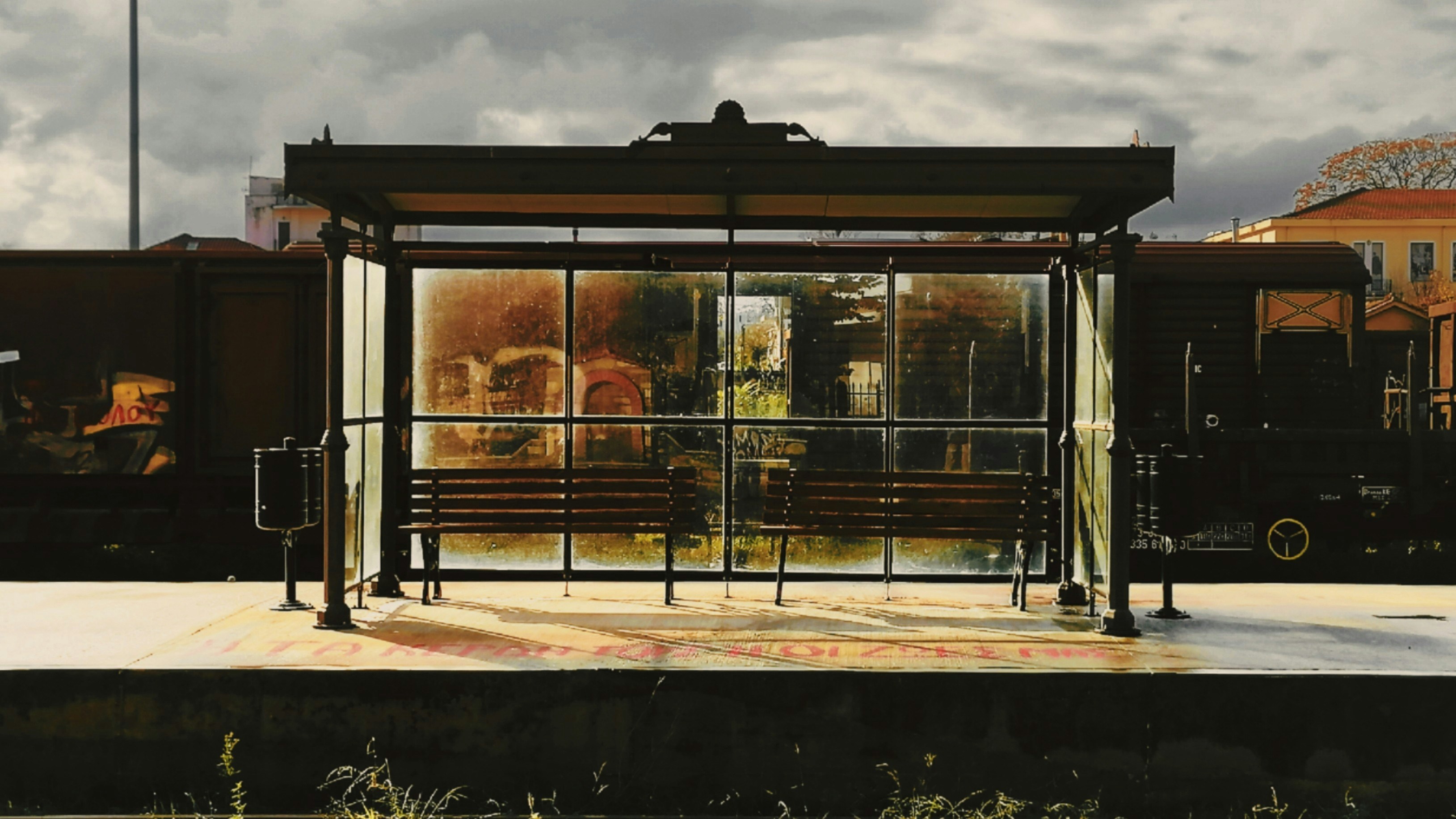 Empty bus shelter at a stop