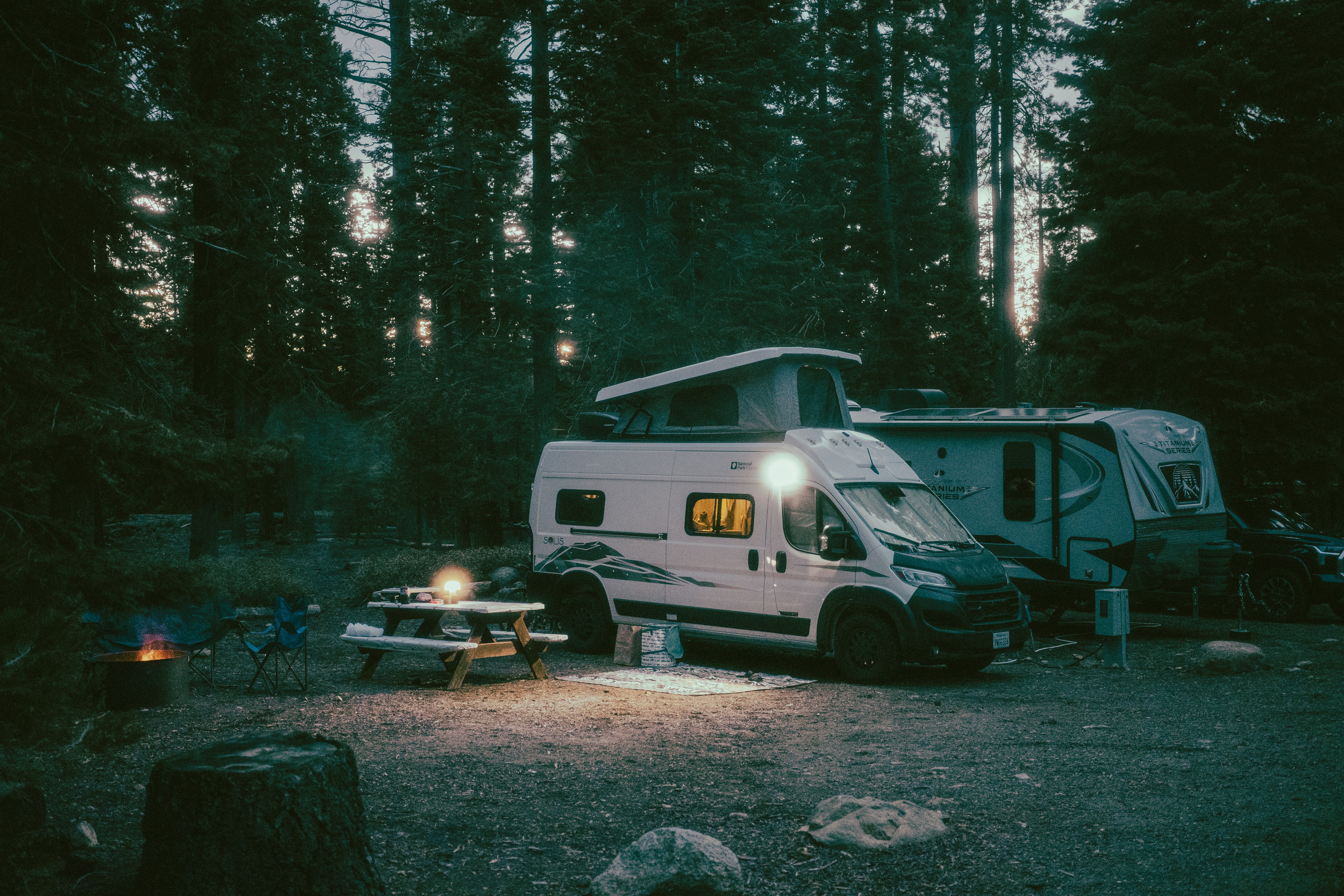 Close-up of a campfire setup at the campground, a focal point to disconnect to reconnect with family.