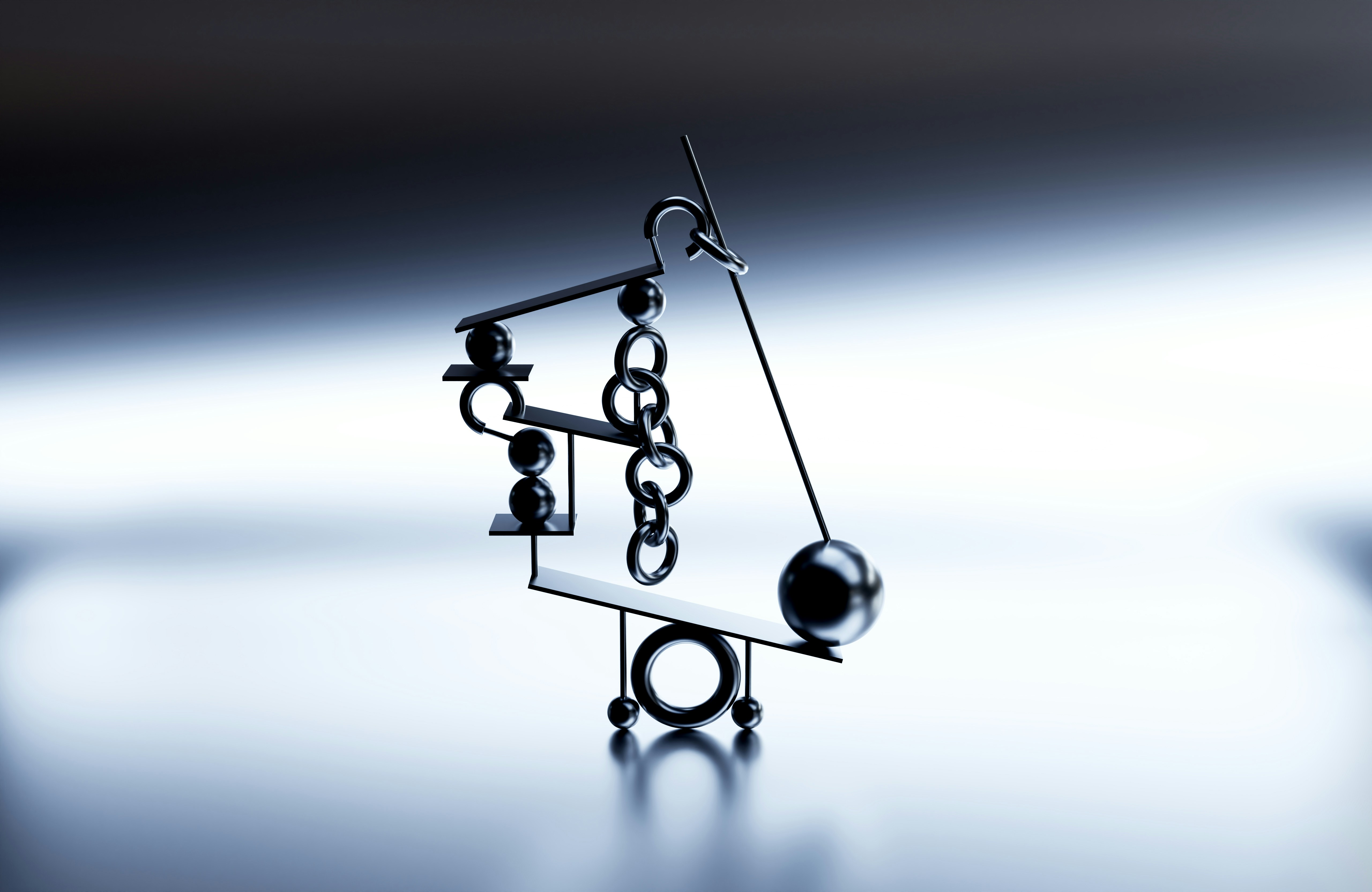 An abstract metallic sculpture with spheres and bars.