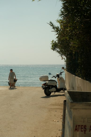Scooter parked by the coast