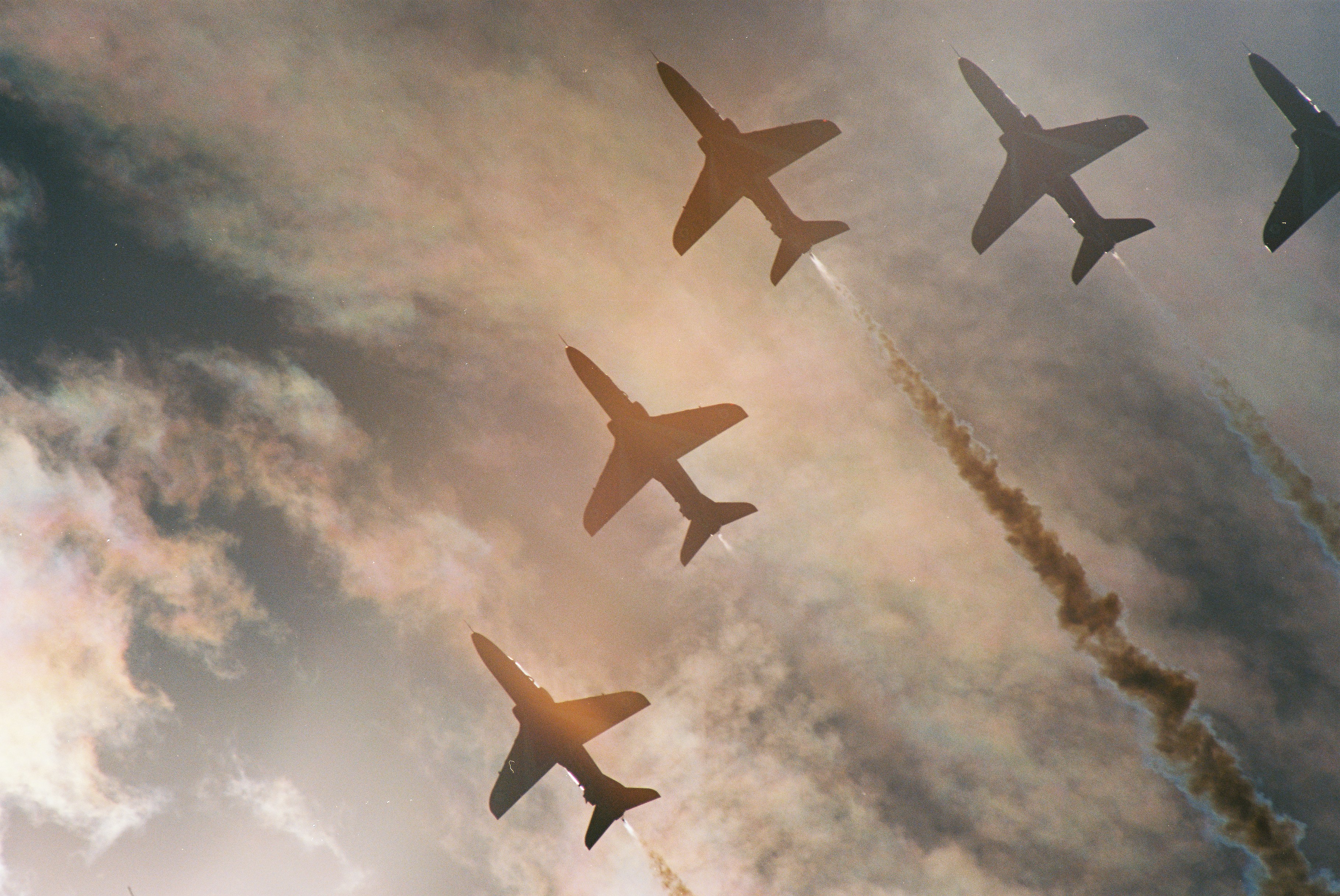 Jet planes flying in formation leaving smoke trails
