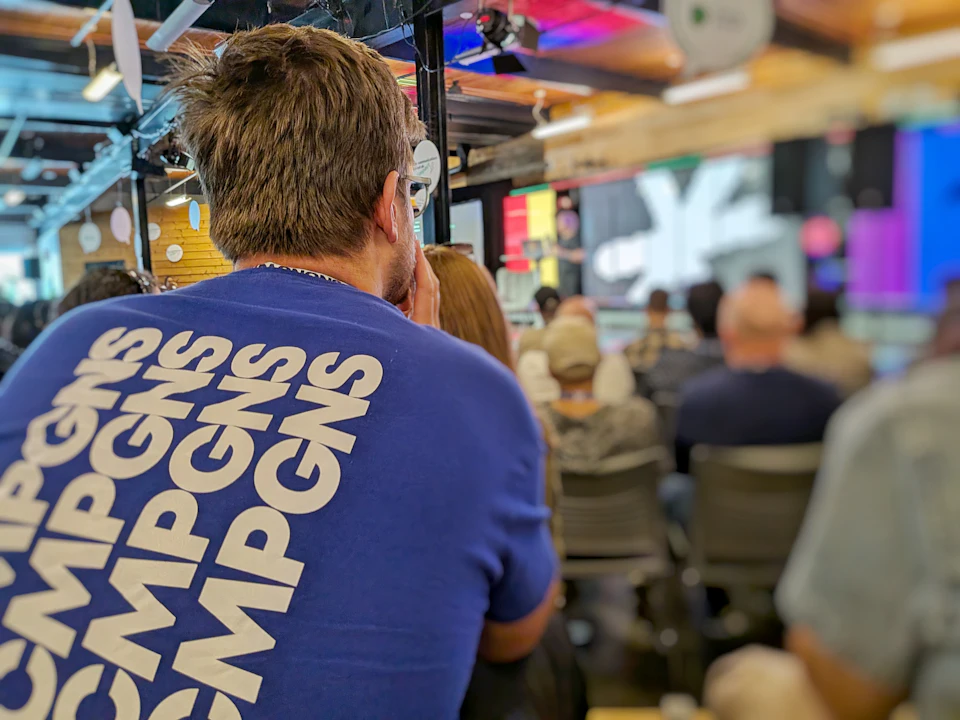 An audience member at an indoor public event