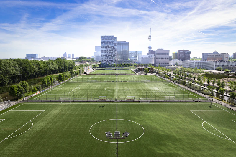 soccer fields with a modern skyline for active singles