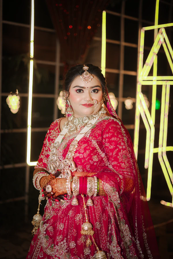 Indian bride in red bridal wear and jewellery