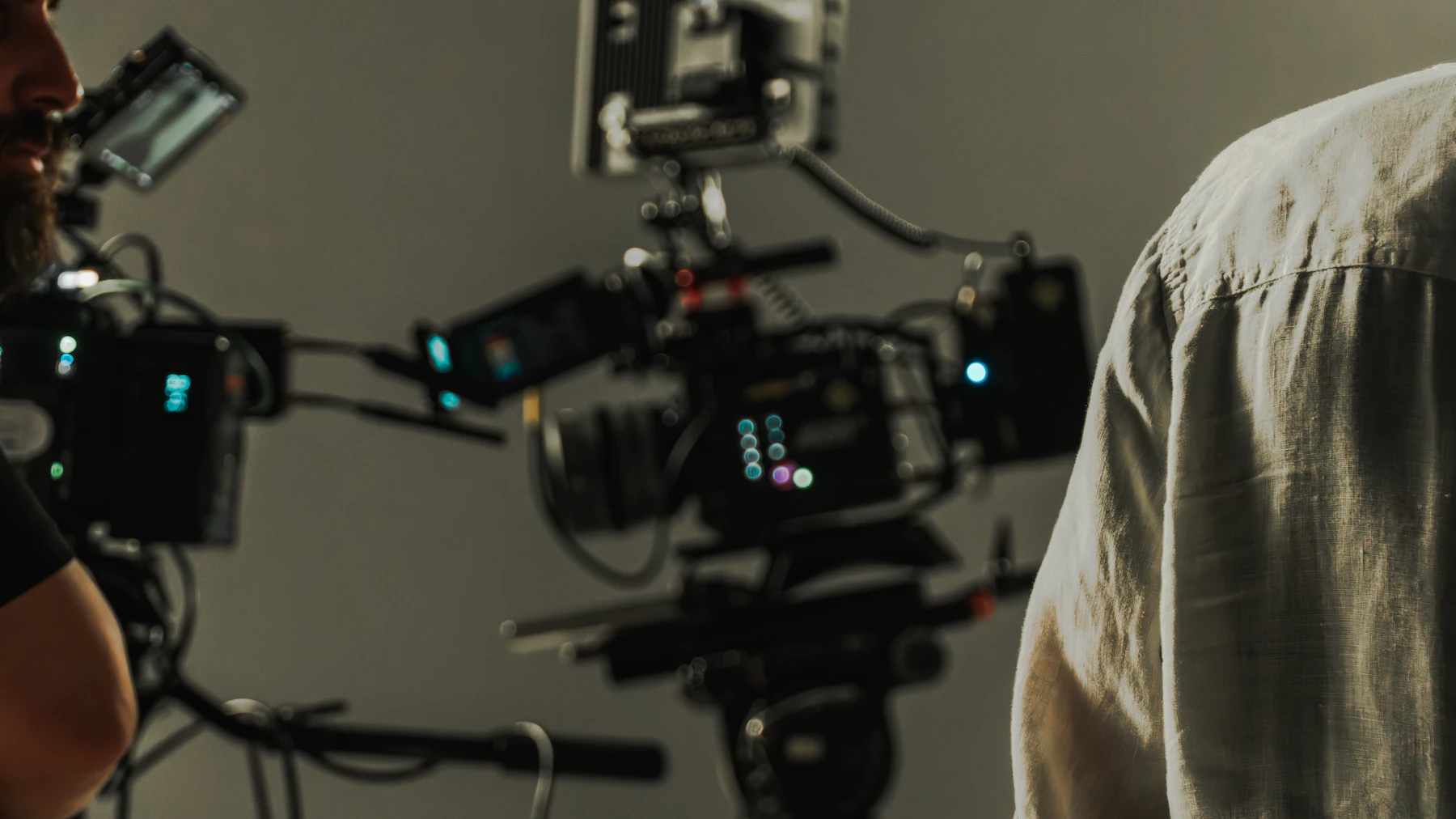 Video production crew preparing a cinematic camera setup