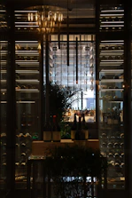 Elegant wine display in a dimly lit restaurant