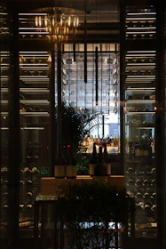 Elegant wine display in a dimly lit restaurant