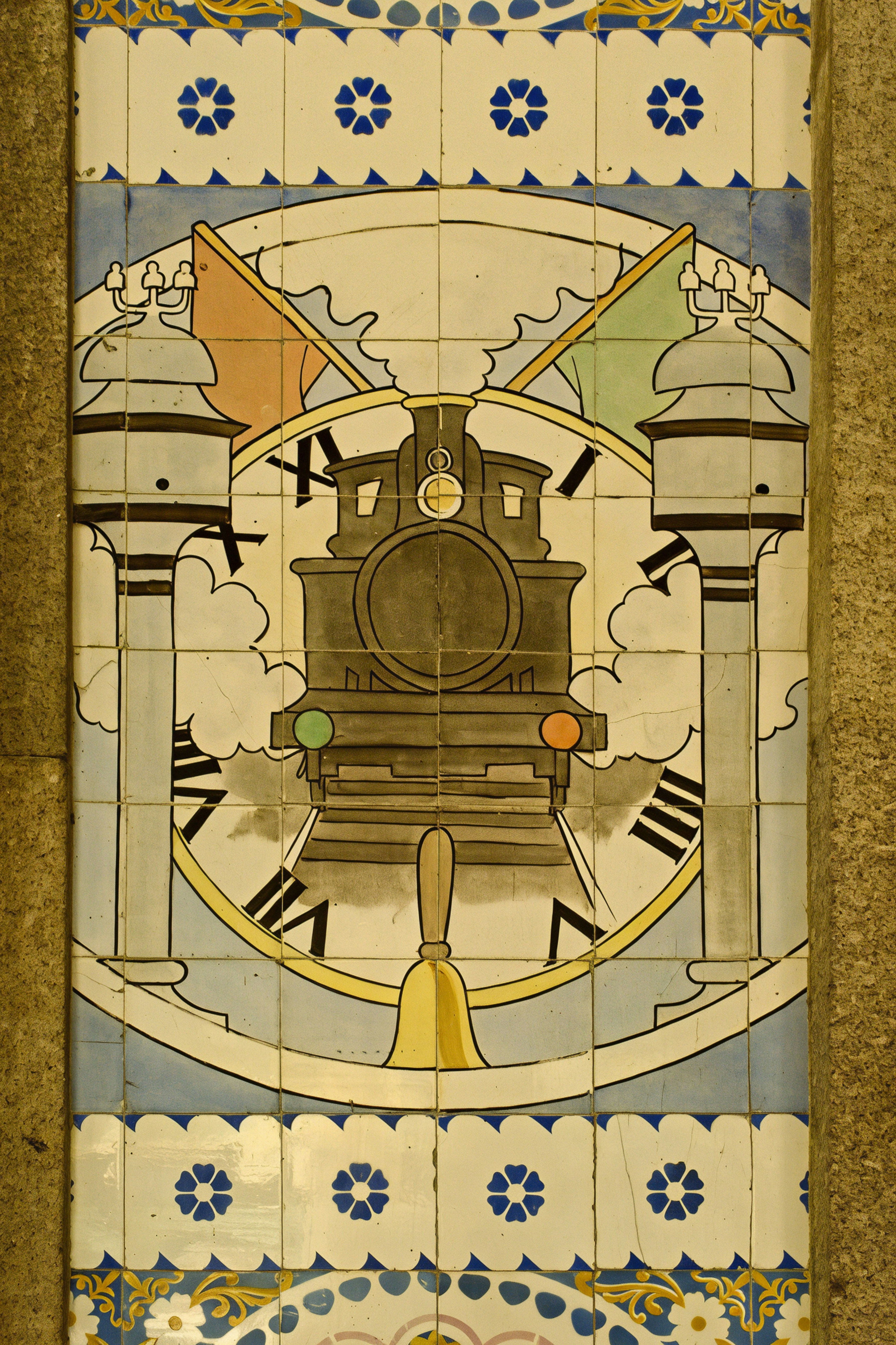 A tiled mural depicting a train, clock, and signal flags.