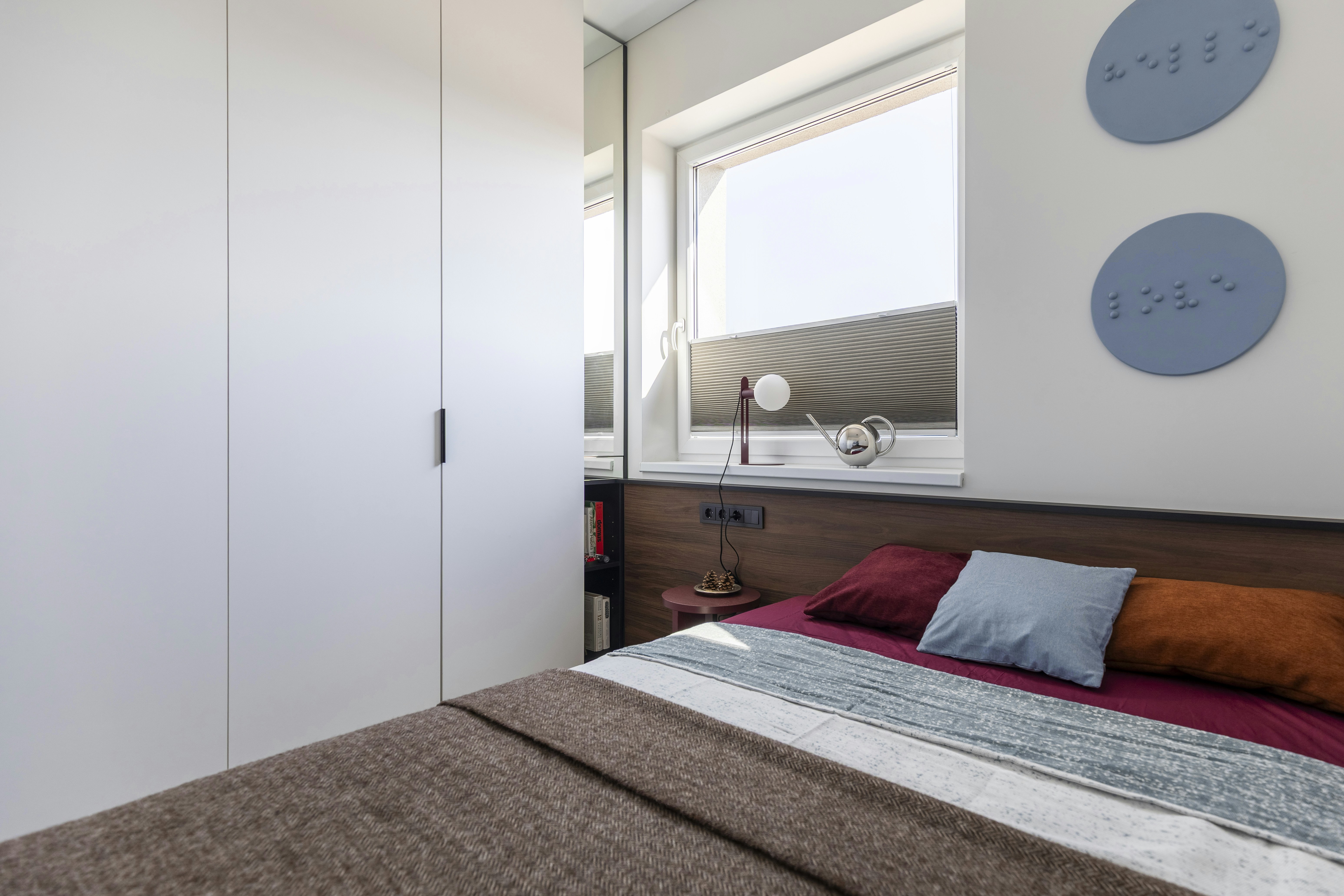 Multi-functional furniture in a small bedroom