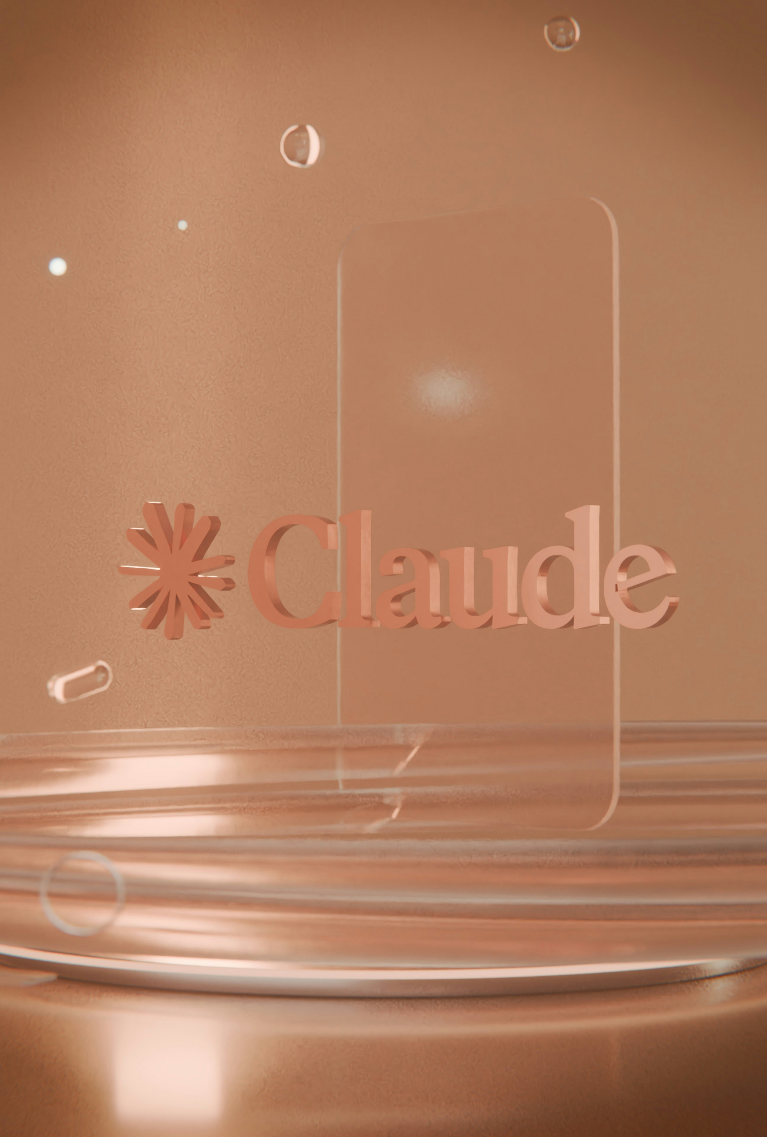 Logotipo de la claude en oro rosa metálico sobre una superficie reflectante.