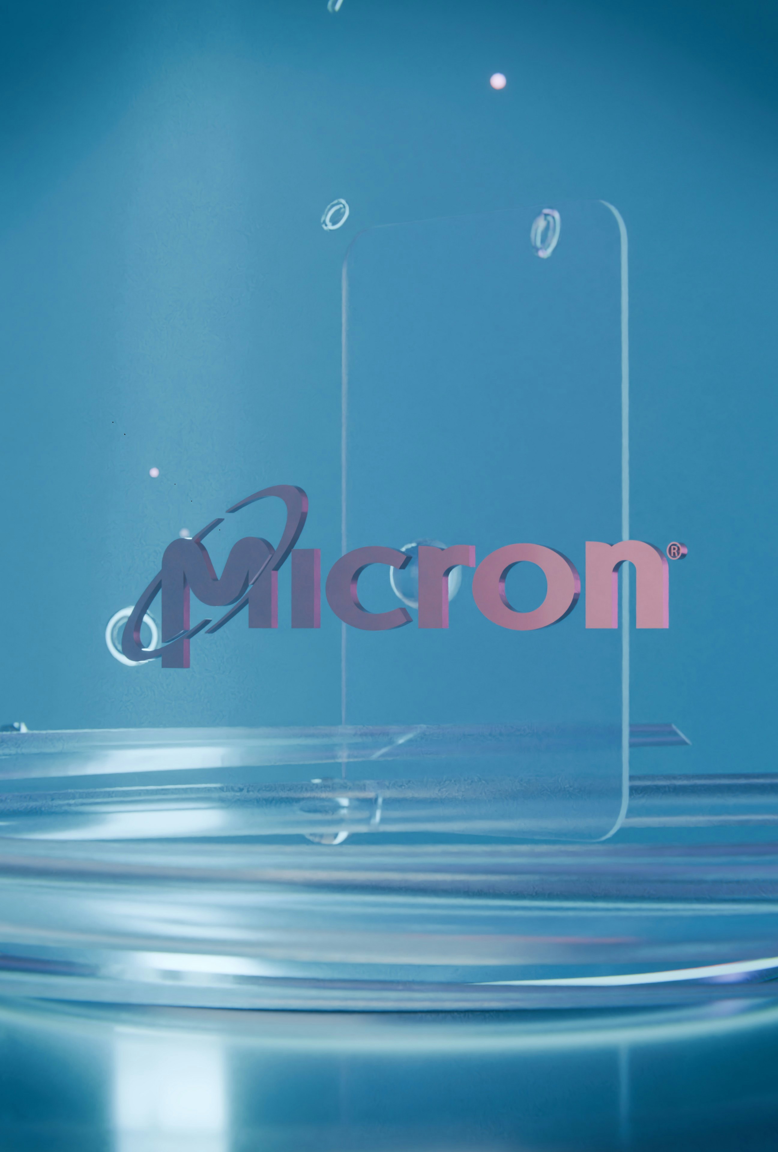 Pink micron logo on a blue, abstract, water-like background.